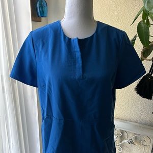 Figs scrub top. Royal Blue . Size small. Worn once.